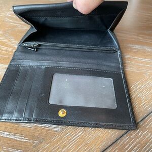 Authentic bi-fold HCL ladies leather wallet. Made in German, used.